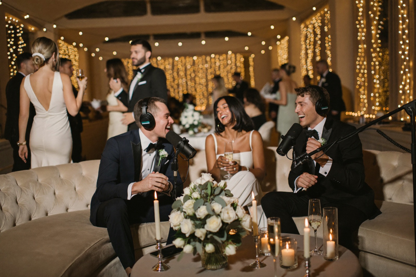 Styled luxury podcast lounge set staged at an elegant wedding venue